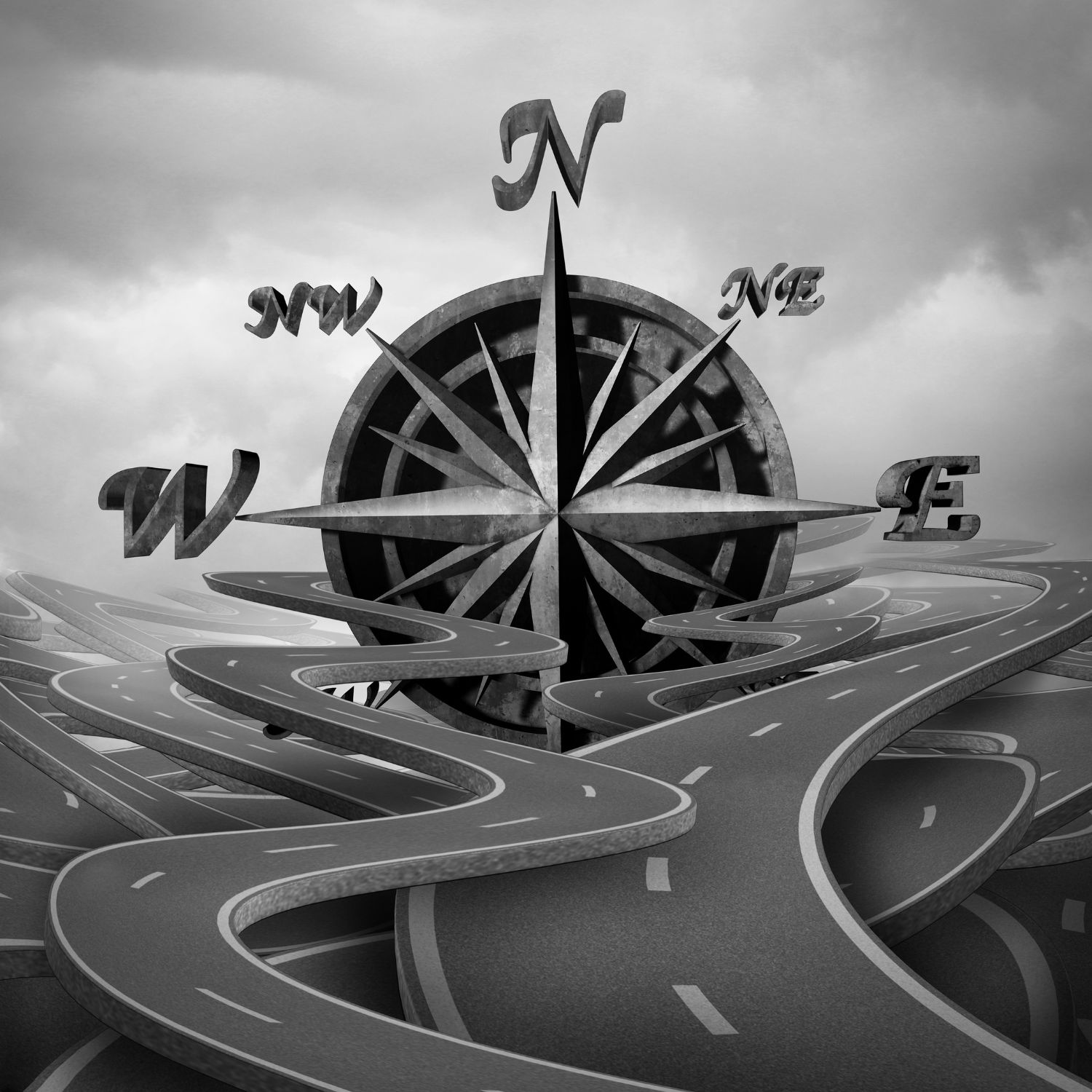 A compass stacked with many winding roads